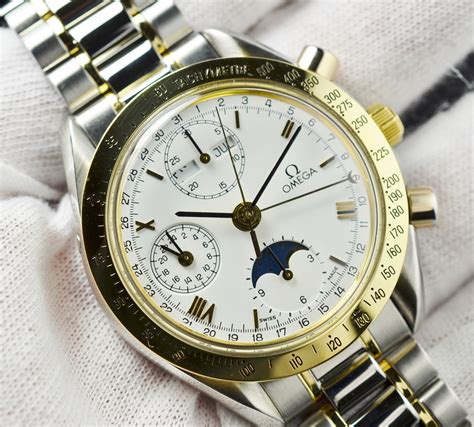 omega speedmaster day date month.